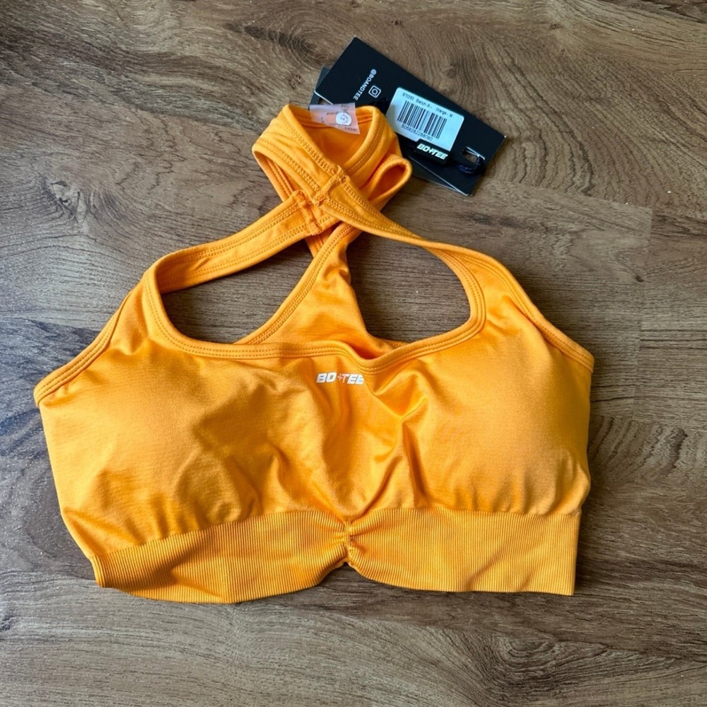 Never worn! Bo+Tee orange work out set.